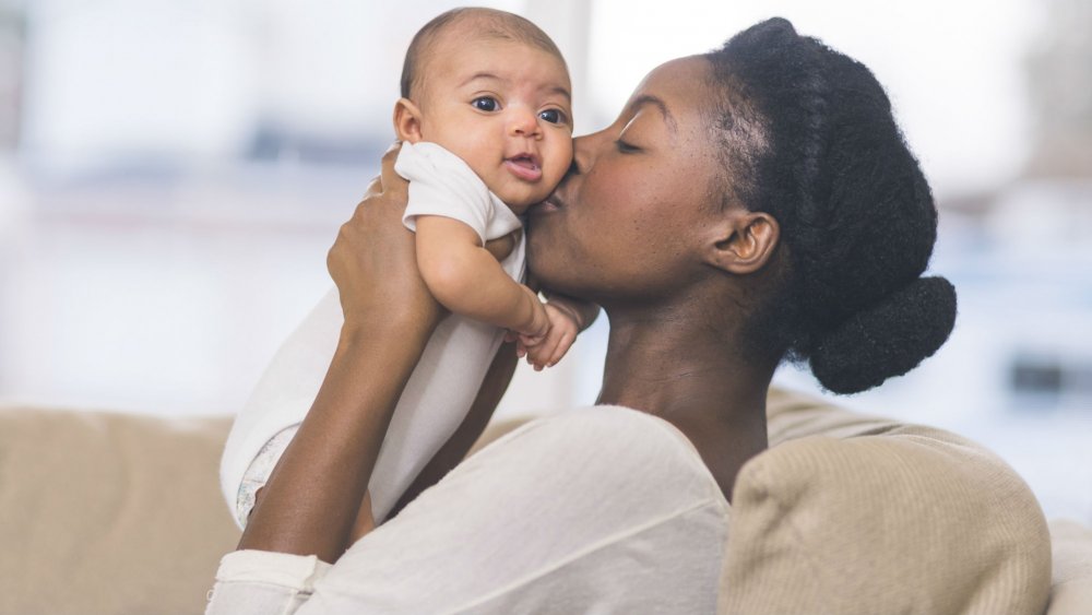 Photo d'une femme et un bébé